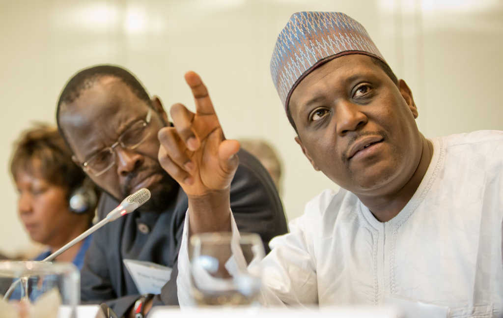 Harvard Ministerial Leadership Program Advisory Board Member Dr. Muhammad Pate (in the right of the picture), who is the CEO of Gavi and the former Minister of State for Health of Nigeria, participates in a discussion during the reconvening of ‘alumni’ Ministers at a Harvard Ministerial Roundtable while other participants listen.